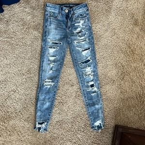 American Eagle skinny jeans heavy distressed